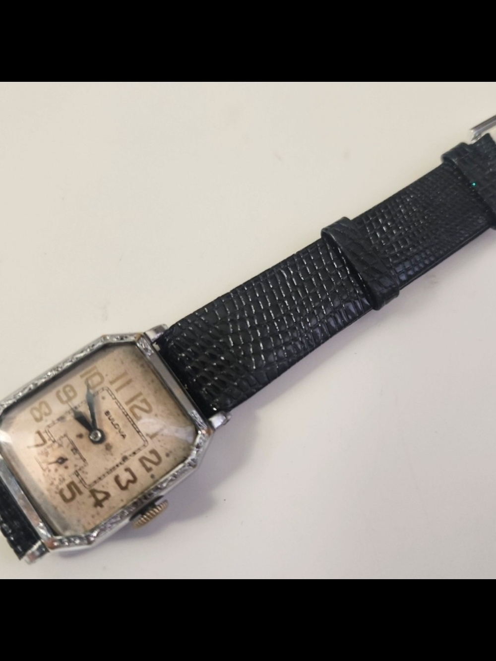 Vintage Bulova watch with Black Lizard-Texture Strap
